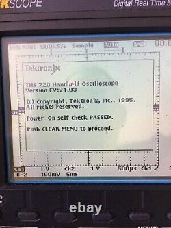 Tektronix Tekscope THS720 100 MHz 2 channel oscilloscope with New Battery Manual