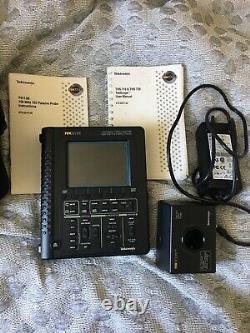 Tektronix Tekscope THS720 100 MHz 2 channel oscilloscope with New Battery Manual